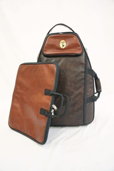 Cover in aged caramel and aged coffee custom leather and metal logo