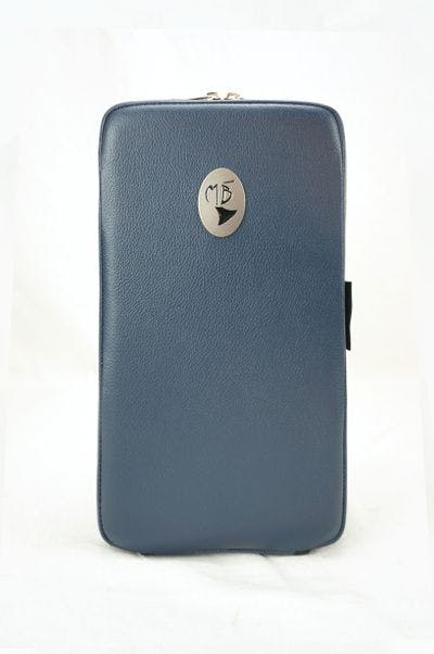 Cover in leather blue with metal logo