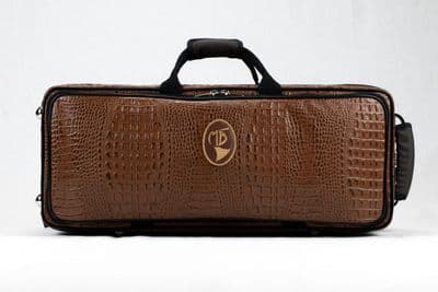 Cover in leather crocodile design and brown logo