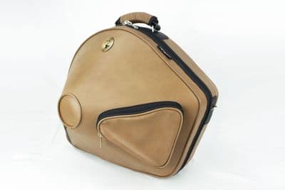 Cover in leather light brown with metal logo