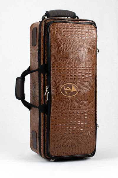 Cover in leather crocodile design and brown logo