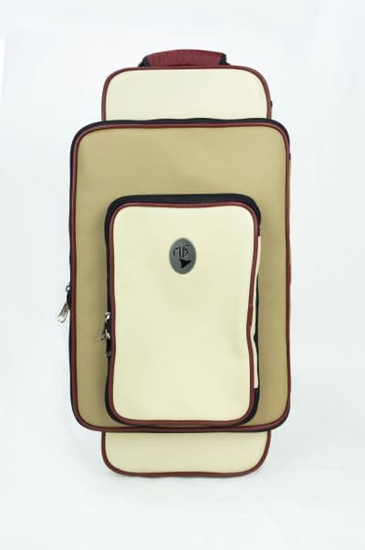 Cover in leather beige and ivory with trim in leather wine and metal logo