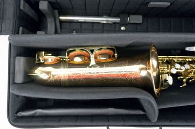 Case with detail of the alto saxophone