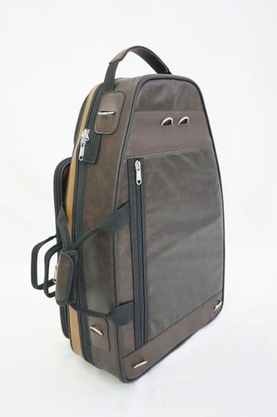 Cover in aged caramel and aged coffee custom leather and metal logo
