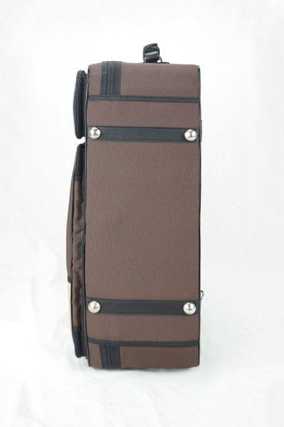 Cover in nylon brown and beige with metal logo
