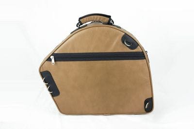 Cover in leather light brown with metal logo