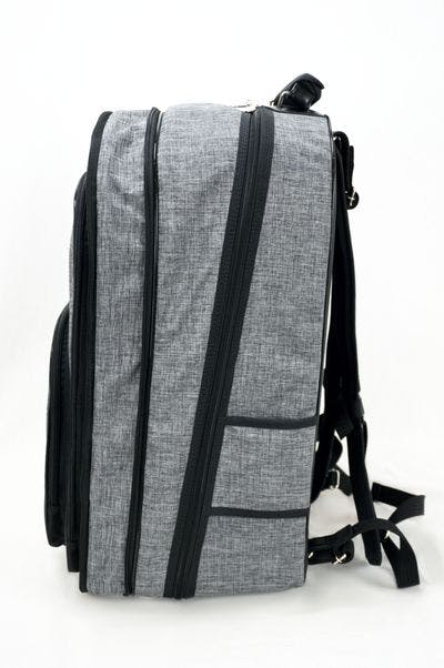 Side of the backpack bag with more 5 cm using the expansion system